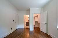 The main level bedroom has a large walk-in closet and an ensuite bath.