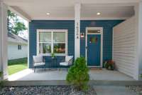 A charming covered front porch welcomes you home.