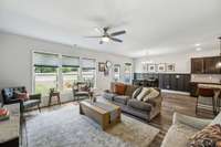 living area with plenty of natural light from the west