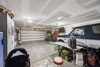 huge double depth garage with space for four vehicles or toys and a workshop!