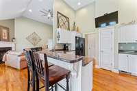 Clean kitchen with open concept living