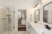 Additional lighting in the closets and bathrooms ensures these spaces are well-lit and welcoming.