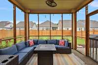 One of the standout outdoor features is the screened-in patio, the perfect spot for morning coffee, evening conversations, or enjoying the outdoors without the bother of insects.