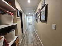 long hallway with built-in shelving