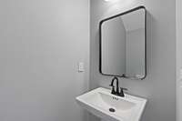 A half bath is conveniently located nearby.