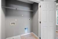 The laundry connection is conveniently located on the same level as the bedrooms.