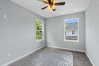 Two more comfortable bedrooms are located on the second floor.