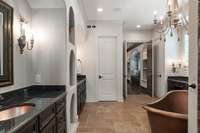 Discrete water closet straight ahead.