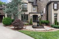 Exquisite landscaping sets the tone. Full irrigation system, even the window boxes are self-watering.
