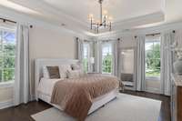 Bedroom 3. Hardwoods and tray ceiling. Big closet, full bath.