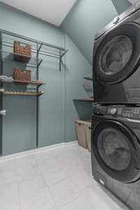 Laundry room sits off of the kitchen. Washer and dryer can sit side by side or stack.