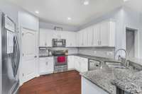 Beautiful kitchen with stainless appliances and granite counter tops!