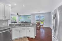 Kitchen opens up to the dining room and living room.