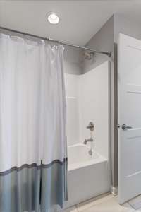 Upstairs bathroom shower.
