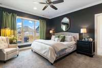 Primary bedroom is located on the main level and features a gorgeous view form the large windows.