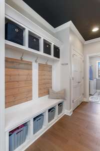 This drop zone is located just inside the garage door, making it the perfect place to drop all your items and keep them organized.