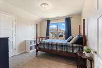 Secondary bedrooms are spacious and have oversized closets.