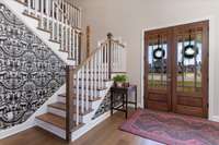 Step into the front entry and experience this beautiful space with design trends!