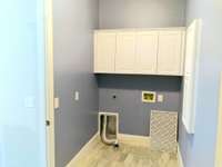 LAUNDRY ROOM WITH BUILT-IN IRONING BOARD !!!