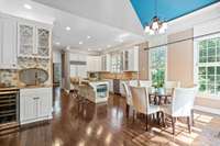 Kitchen casual dining and wet bar with current paint colors