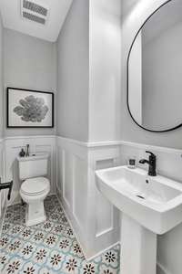 Half bath located just off the kitchen