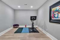 Exercise, media, music room in the basement