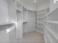 Primary suite walk-in closet