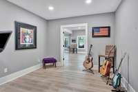 Exercise, media, music room in the basement