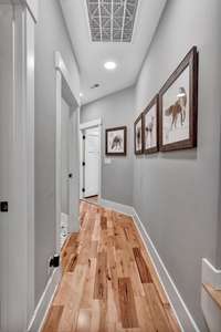 Hallway to the laundry room, garage, and basement