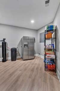 Storage room in basement with extra washer/dryer hookups