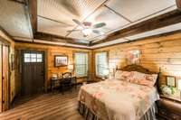 Main bedroom has a door to enjoy the porch