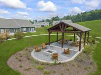 Another look at the community Pavilion and Firepit. Great space to enjoy with your family and Friends.