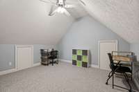 Small room attached to secondary bonus room. Perfect area for home schooling.