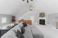 Massive bonus room with built in's, wet bar, fireplace, and storage - second level.