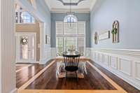 Large dining room right off the kitchen. Large windows bring in lots of natural light.