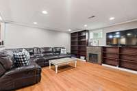 Basement apartment living room with built-ins.