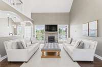Spacious living room with tall ceilings. Large space for entertaining and family gatherings.