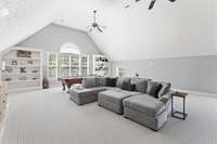 Massive bonus room with built in's, wet bar, fireplace, and storage - second level.
