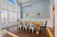 Large dining room right off the kitchen. Large windows bring in lots of natural light.