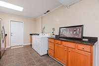 Entry to basement apartment. Walk into the mudroom/laundry room.