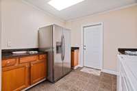 Entry to basement apartment. Walk into the mudroom/laundry room.