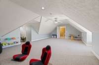 Secondary bonus room. Opening on the left leads down a few steps to another small room. Perfect area for home schooling.