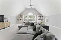 Massive bonus room with built in's, wet bar, fireplace, and storage - second level.