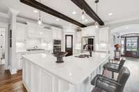 Stunning kitchen featuring upgraded wood flooring and a sleek 5-burner gas stove, perfect for the home chef. 4416 Attleboro Dr. Murfreesboro, TN 37128
