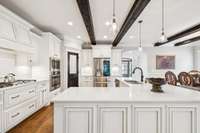 A massive L-shaped island offers ample prep space and room for seating, ideal for entertaining. 4416 Attleboro Dr. Murfreesboro, TN 37128