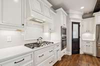 Soft-close cabinetry, a built-in oven, and a double basin sink enhance both style and function. 4416 Attleboro Dr. Murfreesboro, TN 37128