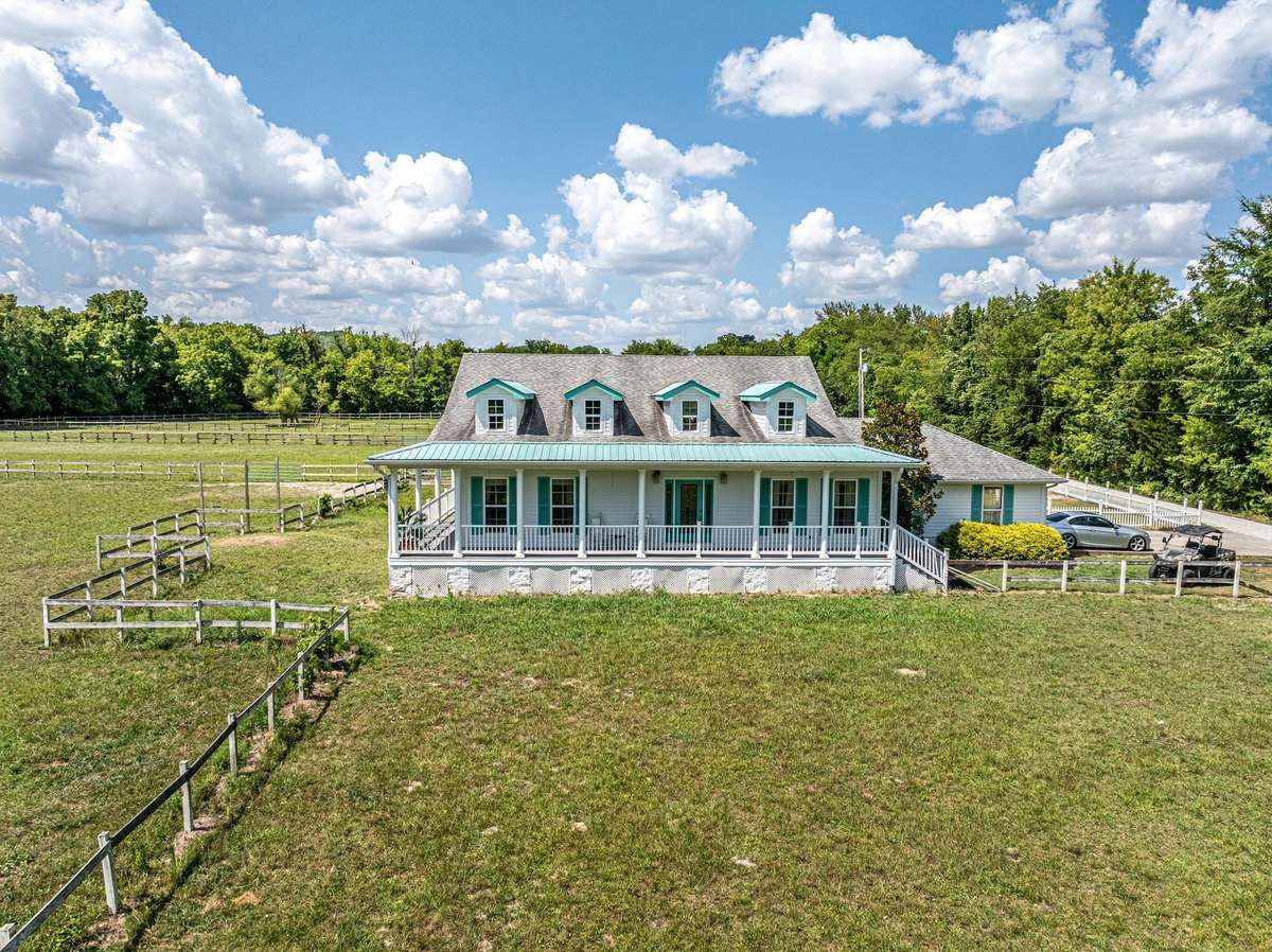 2290 Osborn Rd, Arrington, TN. 
Wrap around porch and 4 gable, roof design, set off this 3 BR/ 2 BA single level home.