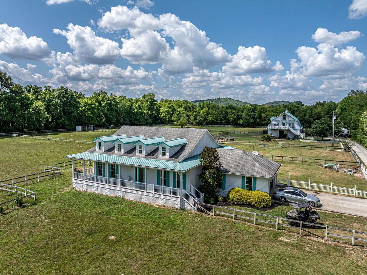 This home has a 2 car garage with for 4 additional parking spaces outside the garage.