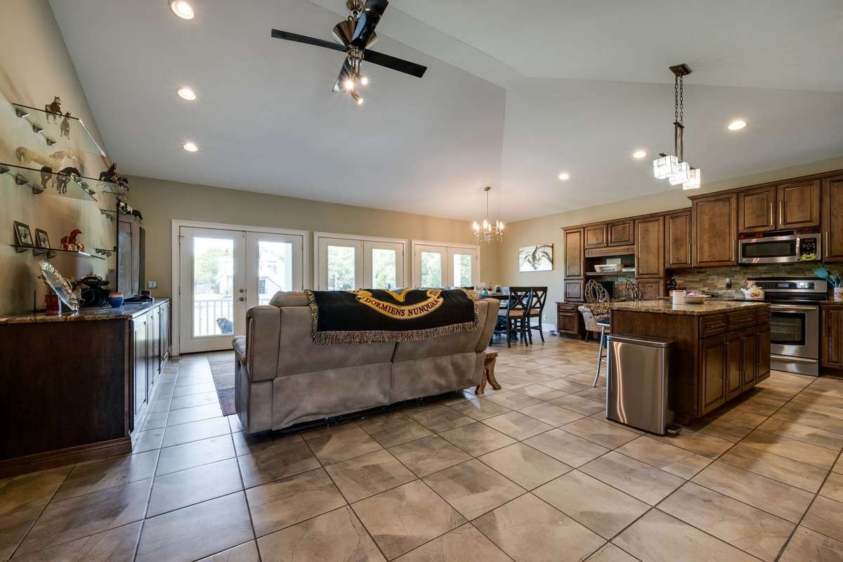 Very open, well lite living space, kitchen, kitchen island, and dining area. Ceramic tile flooring throughout living area.