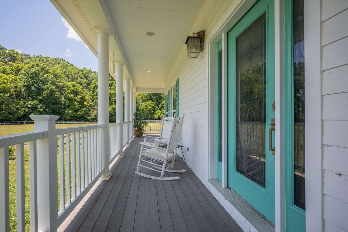 Wrap around porch can be a great place to watch nature's changing seasons.